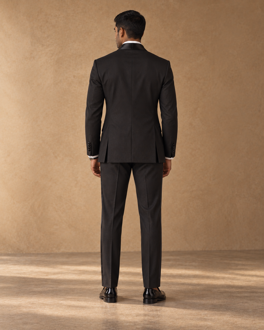 The Nocturne black double-breasted fine-wool tuxedo, rear fit view