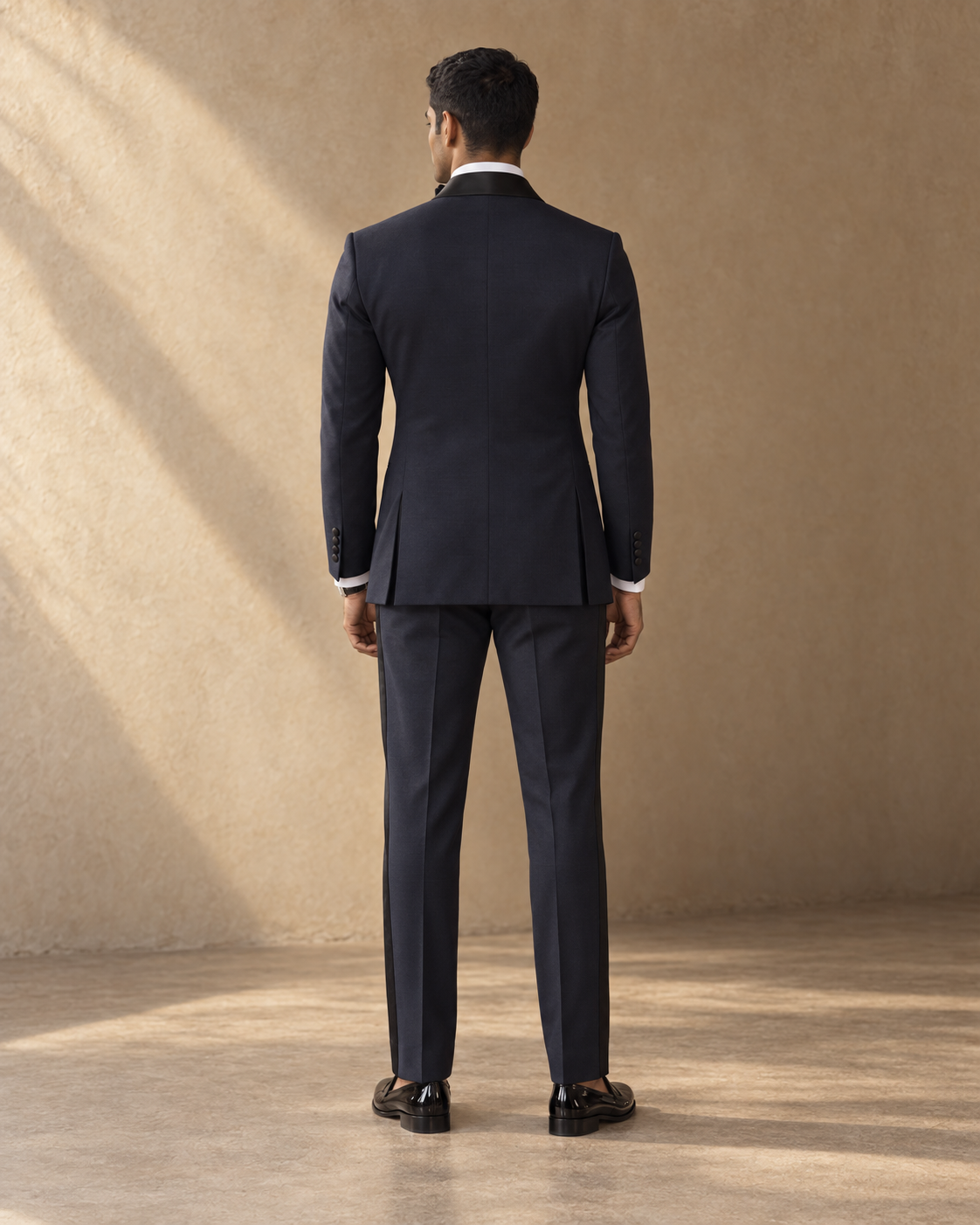 The Nocturne midnight-blue double-breasted fine-wool tuxedo, rear fit view