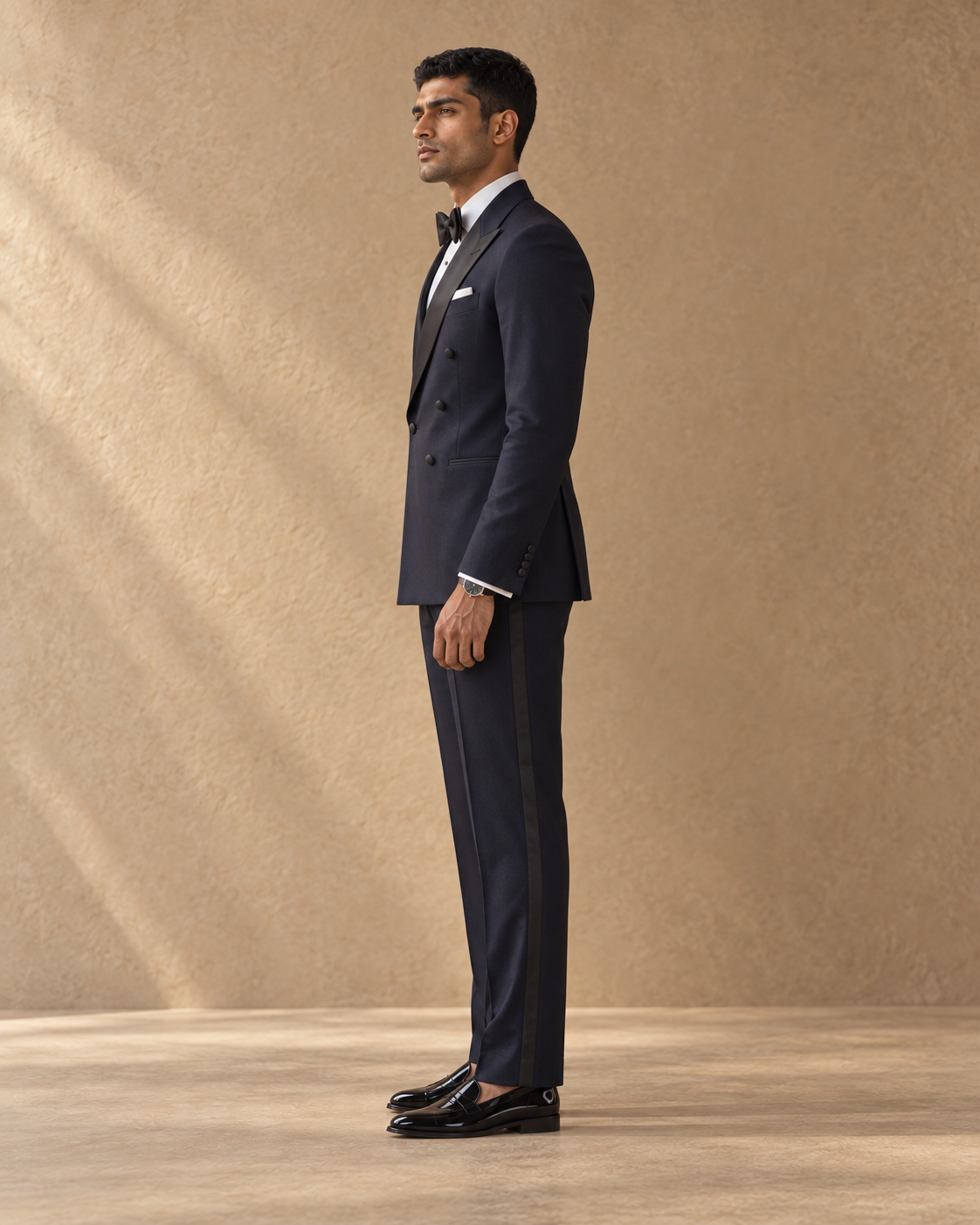 The Nocturne midnight-blue double-breasted fine-wool tuxedo, full-length side profile