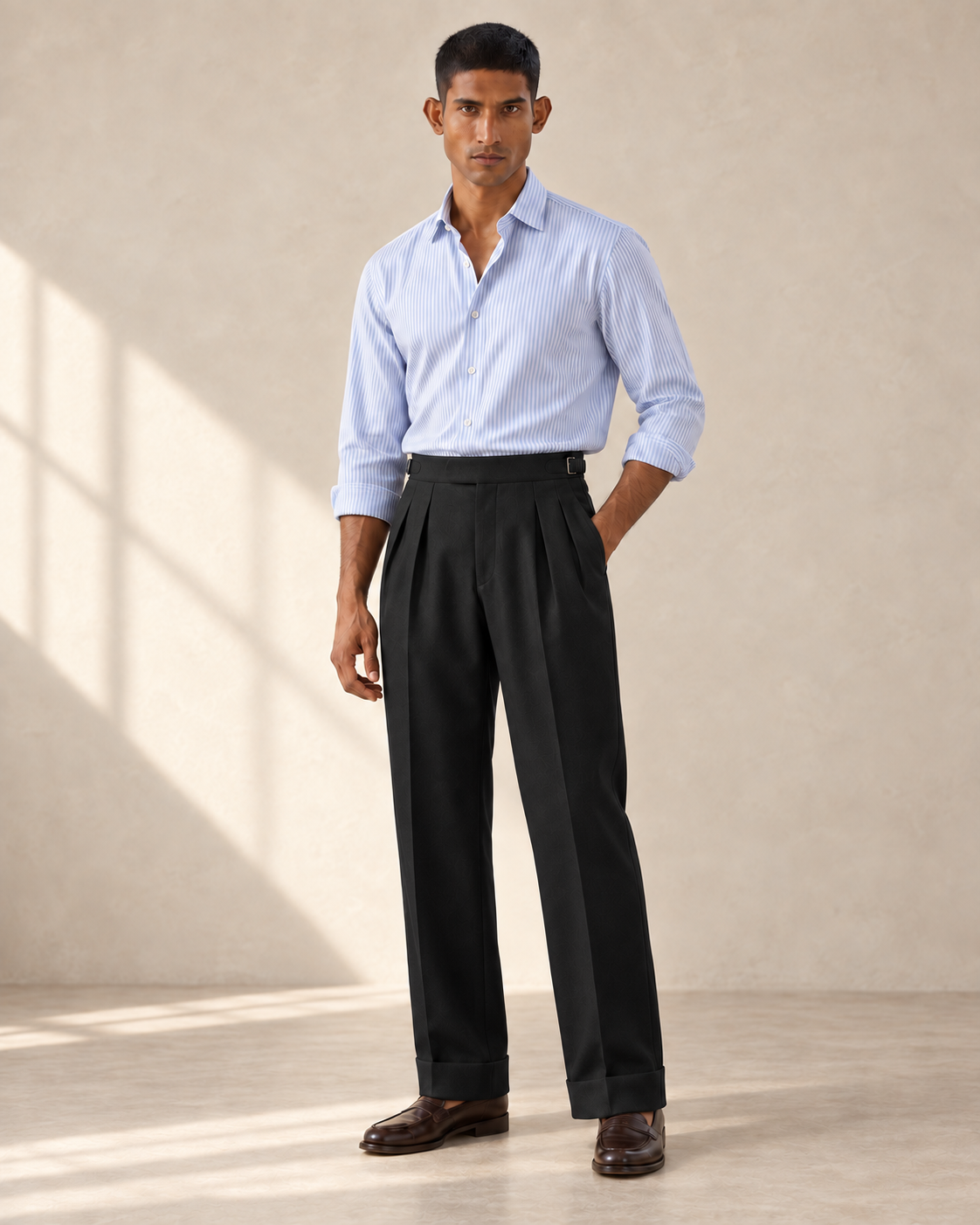 SALVE The Cadogan double-pleated trousers in black, front full-length view