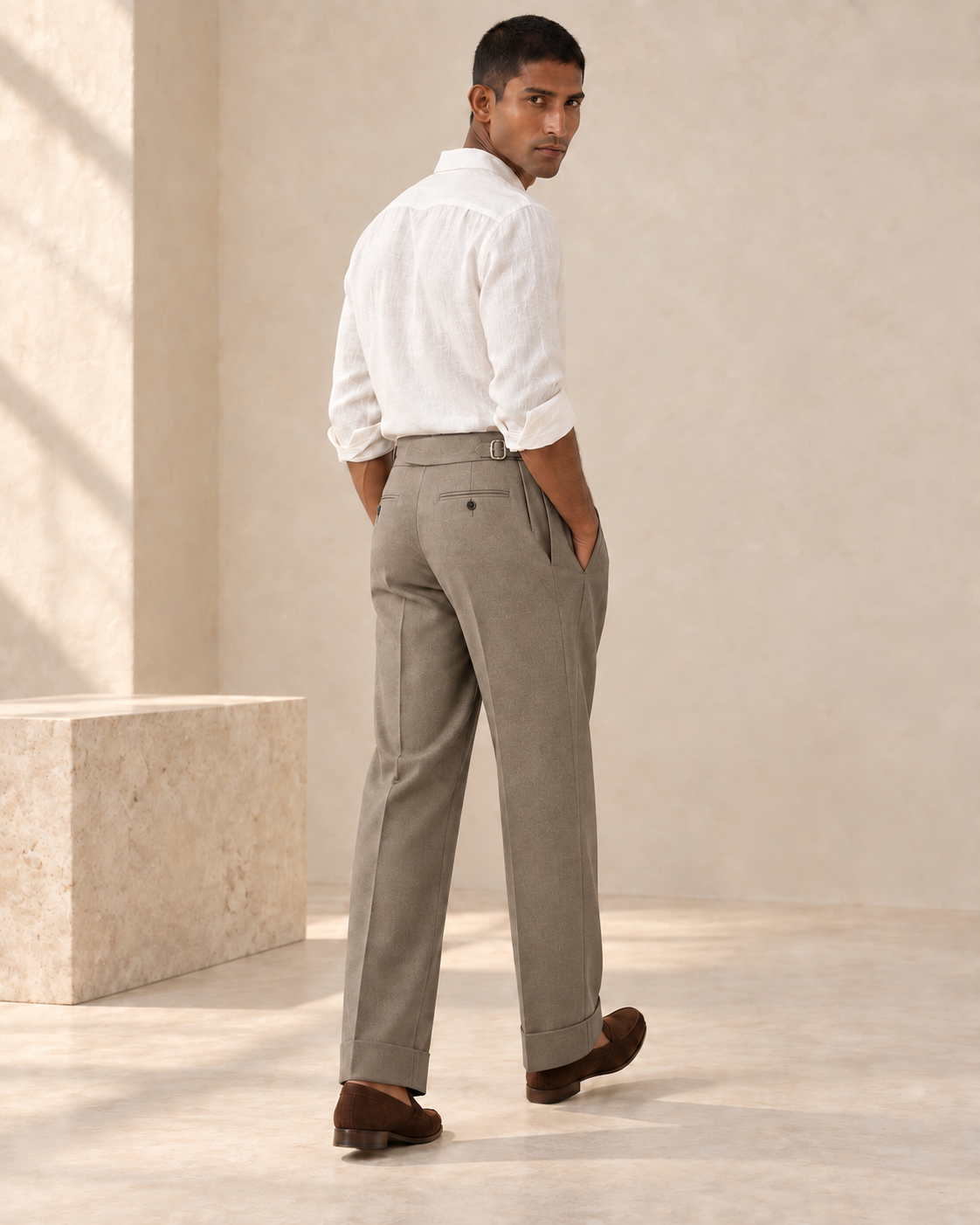 SALVE The Cadogan double-pleated trousers in khaki, rear three-quarter view