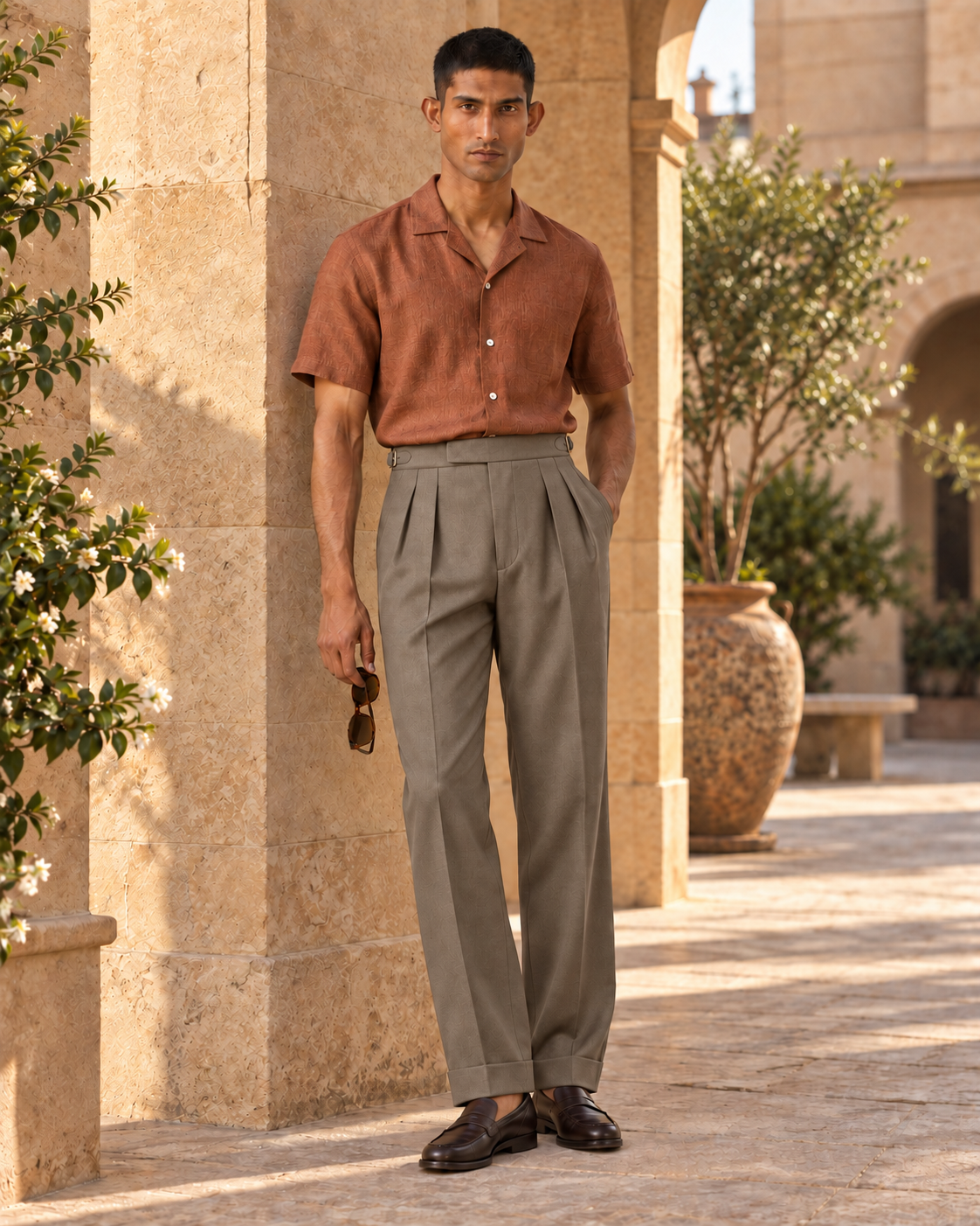 SALVE The Cadogan double-pleated trousers in khaki, worn in daylight