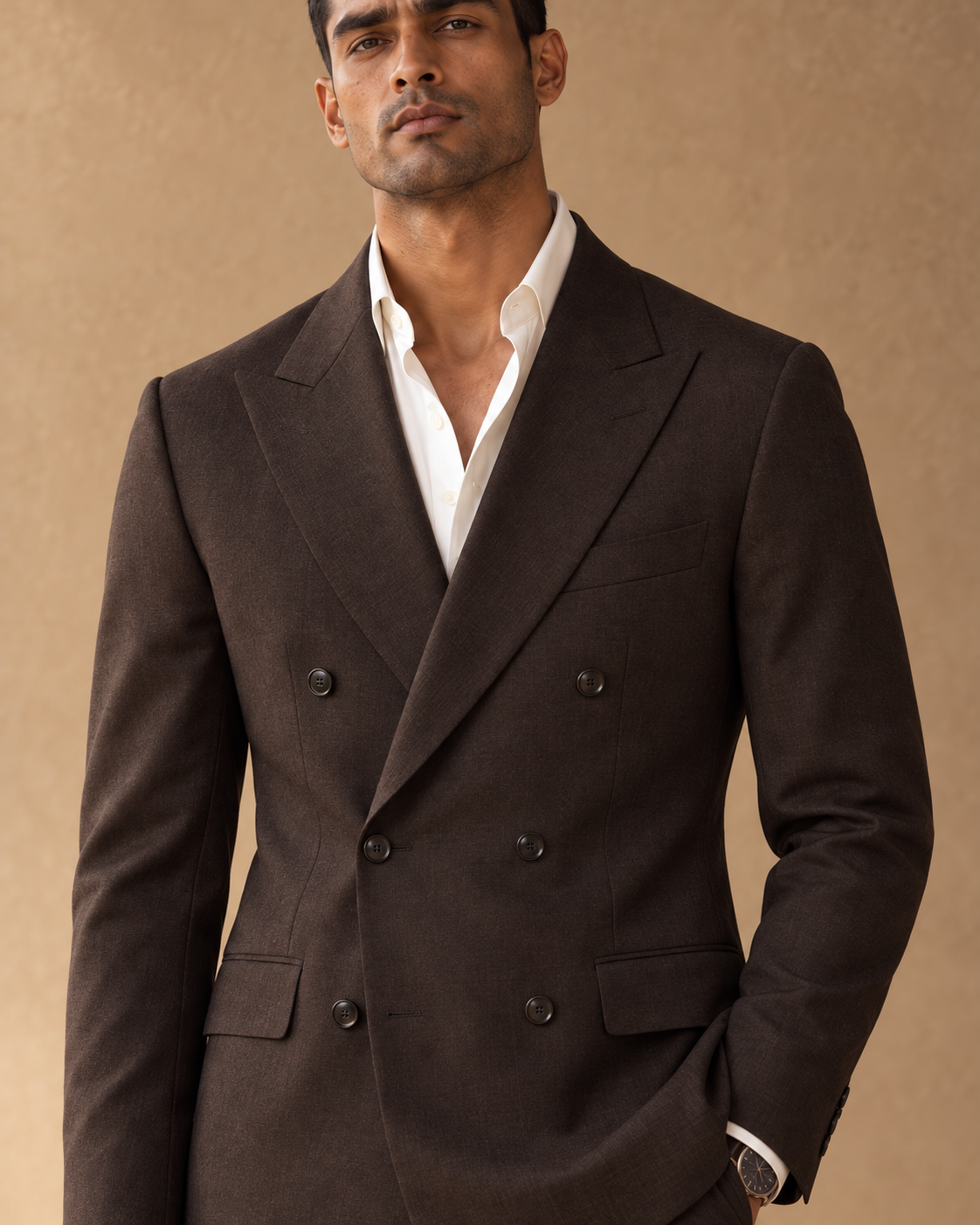 The Regent dark-chocolate fine-wool suit, peak lapel and button detail
