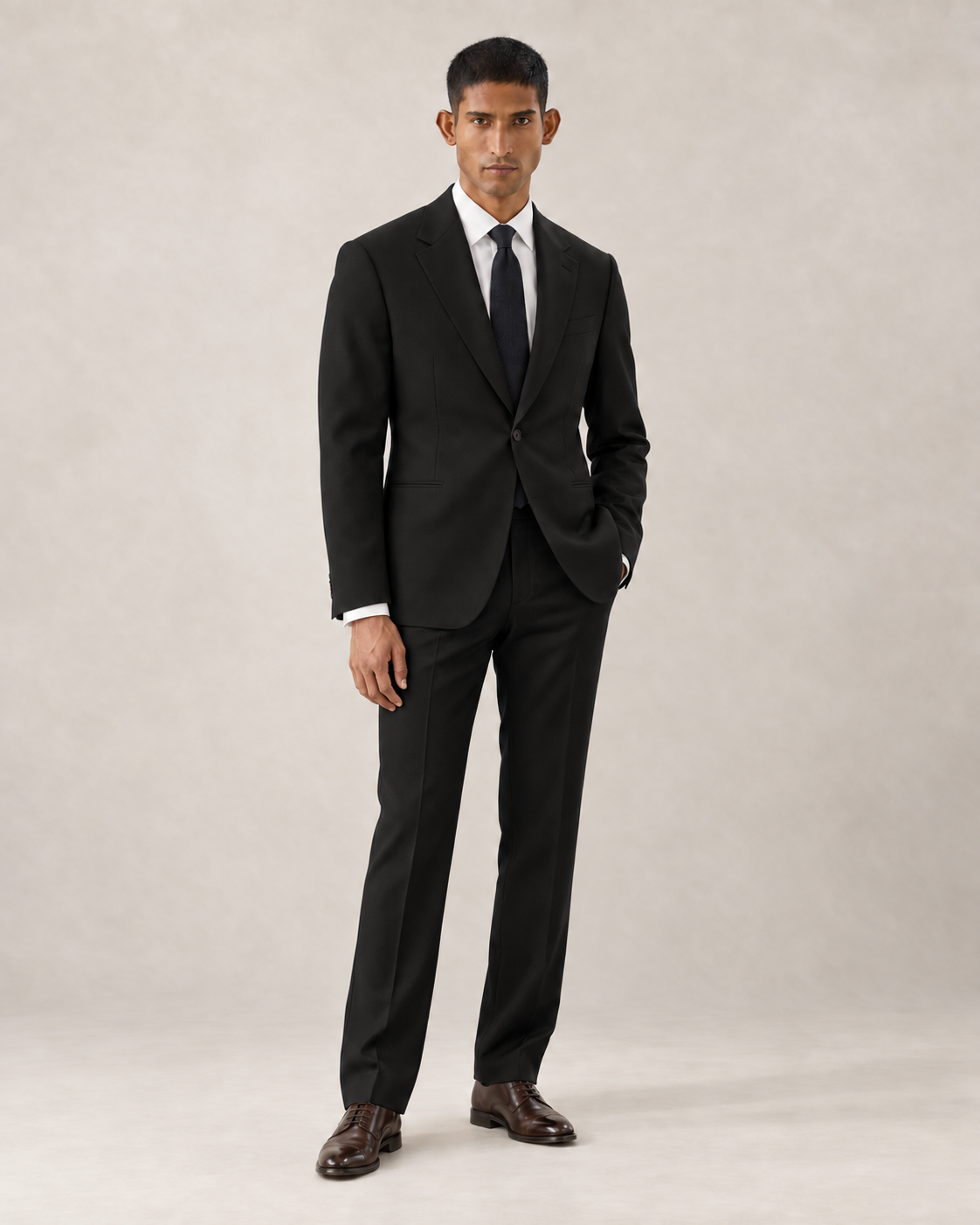 SALVE The Lutyens two-piece suit in black, front view