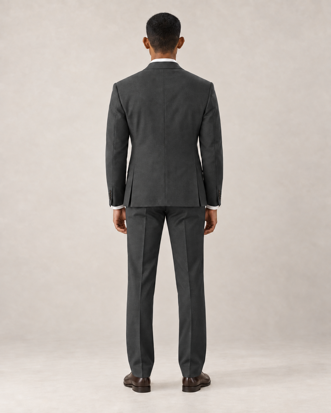 SALVE The Lutyens two-piece suit in charcoal-grey, back view