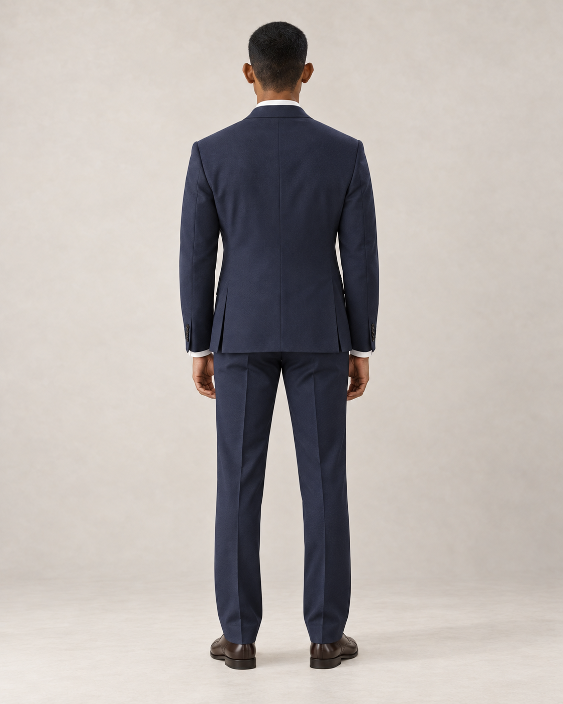 SALVE The Lutyens two-piece suit in navy, back view