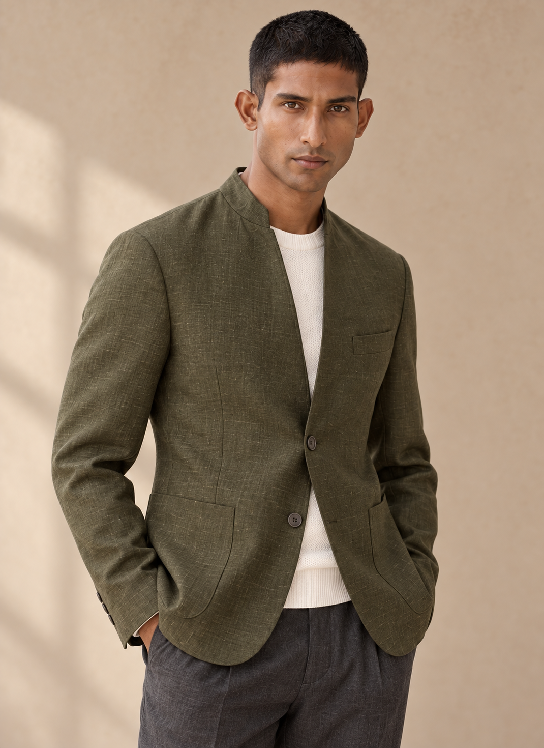 SALVE The Viraj linen sports jacket in olive-green, standing collar and open front detail